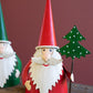 Set of 2 Painted Iron Santas Holding Tree and Sign