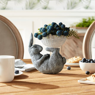 Lying down rabbit with basket